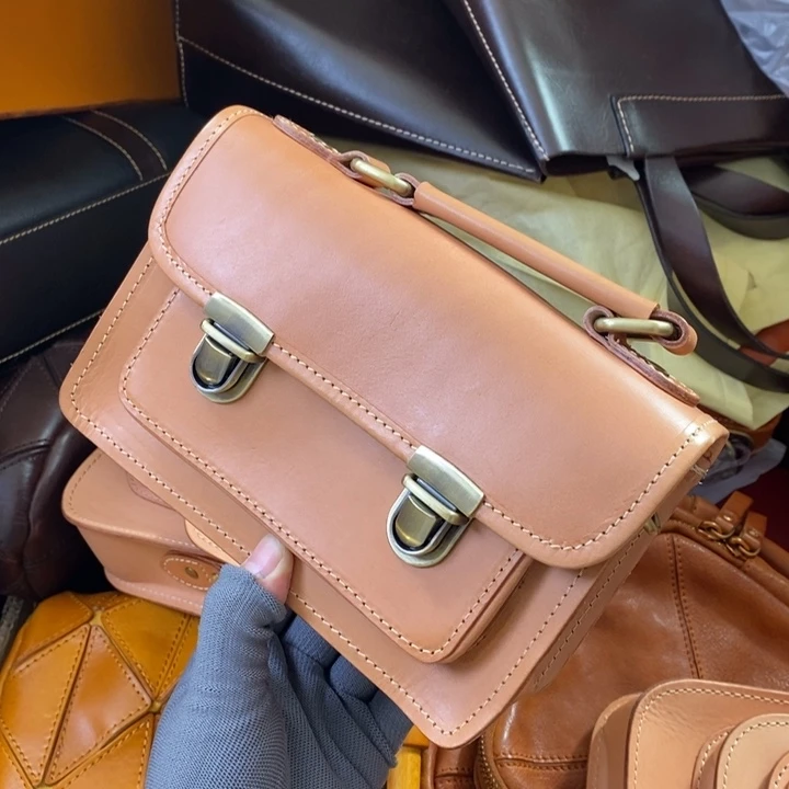 头层牛皮瑕疵单肩包