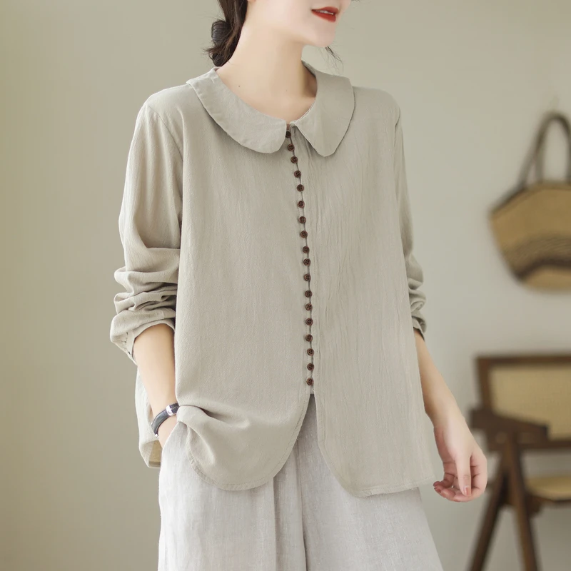 文艺通勤娃娃领杏色长袖衬衫女时尚复古简约宽松百搭多扣装饰衬衣