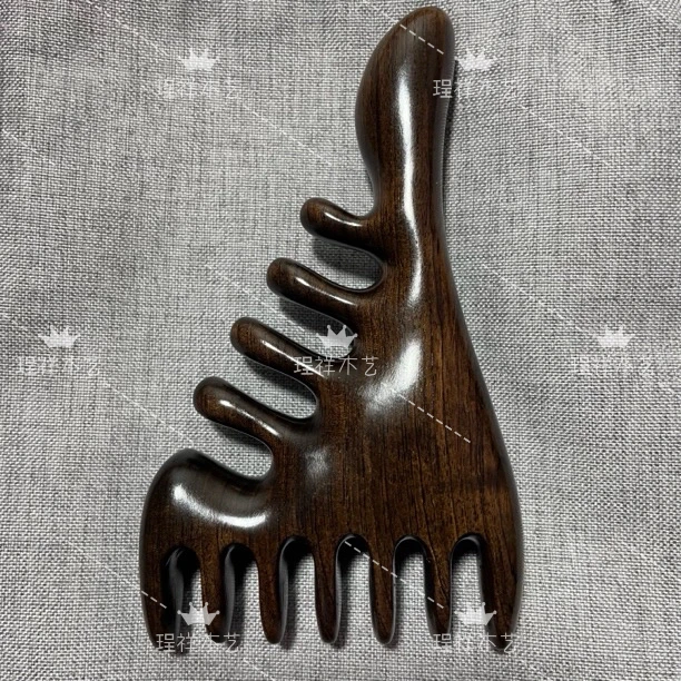 紫光檀大拇指按摩梳