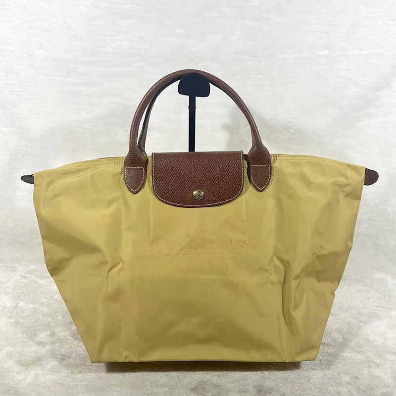 95新  longchamp珑骧中号黄色尼龙手提腋下包G24020639底长28X27