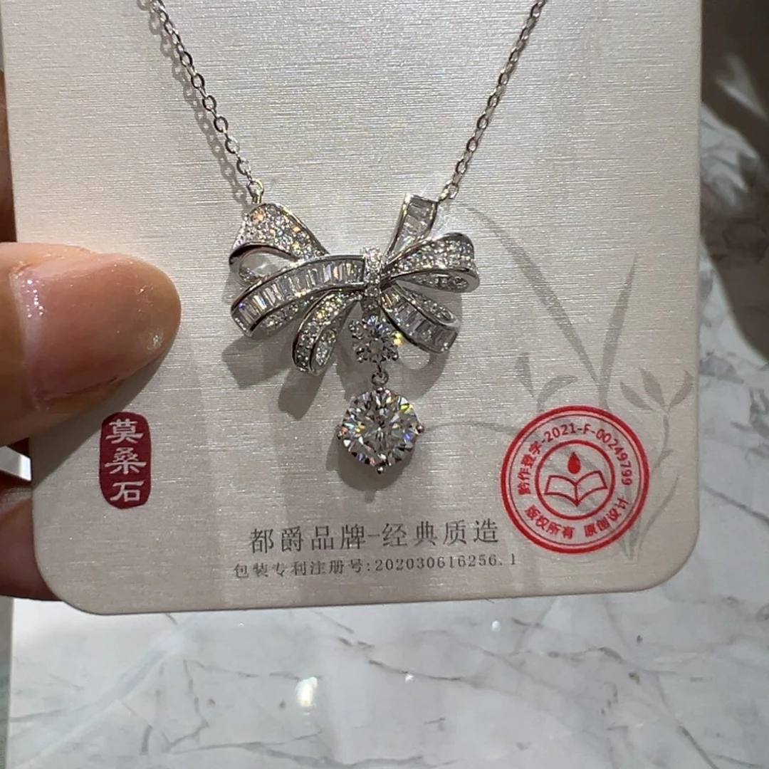 合成碳硅石吊坠925银爆款一克拉蝴蝶结