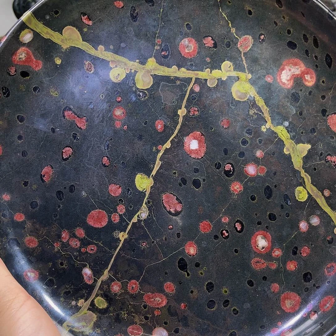 觉*梅花石安山玉精品微瑕