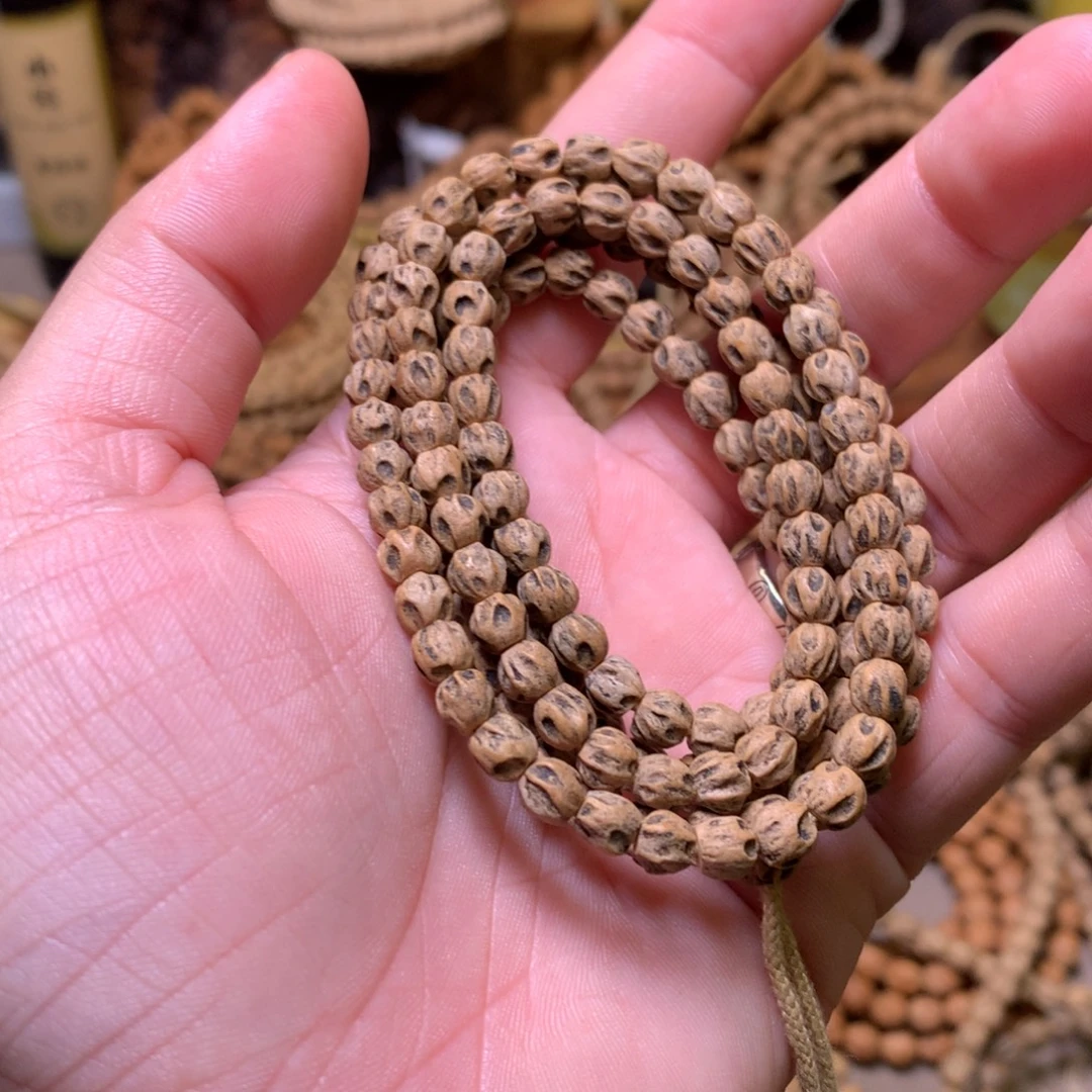 叶***问柏香籽/百香籽吊坠