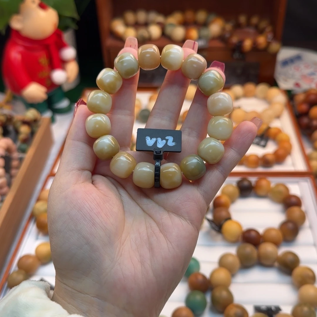 菩提根/象牙果手串卡14桶珠飘花微微瑕