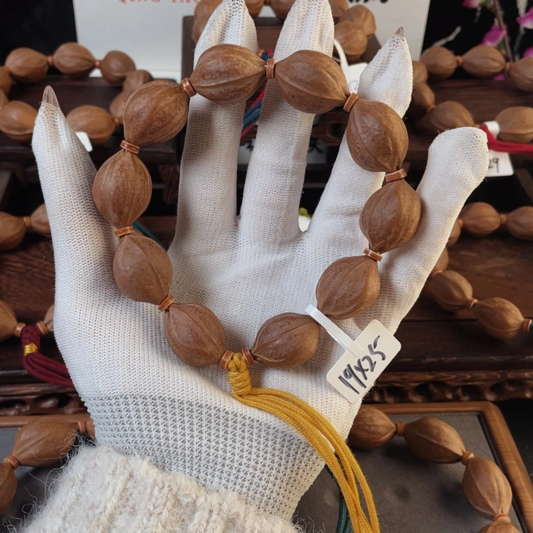 蓬***展手串橄榄核原生态梅林铁核19*25