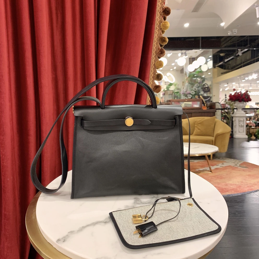 95新 Hermes/爱马仕 GGSherbag31黑金防水布拼皮单肩包11819721