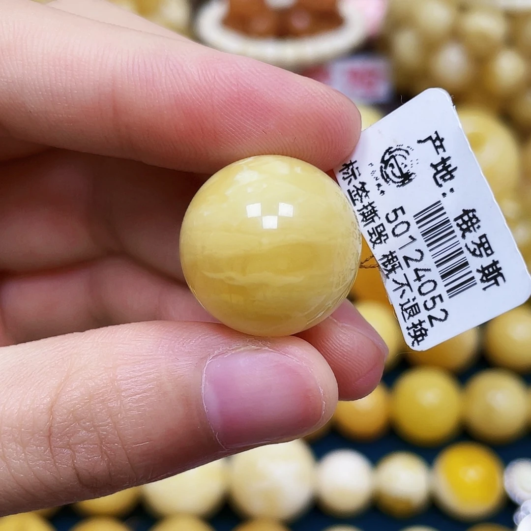 琥珀未镶嵌裸石19.4mm.瑕