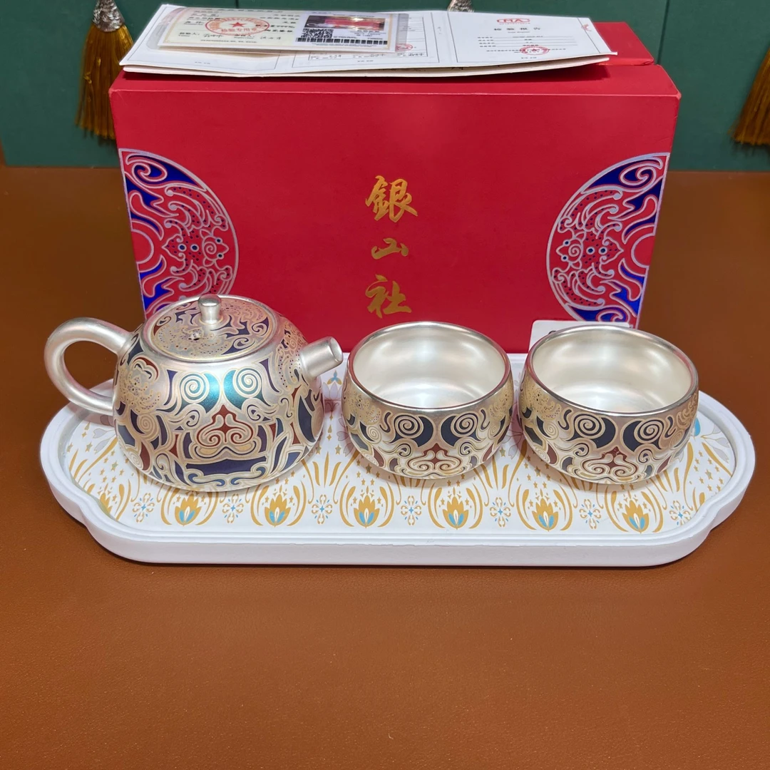ZH3877银山社精美饕餮镀银一壶两杯搭礼盒加绚丽孔雀纹素底海棠形
