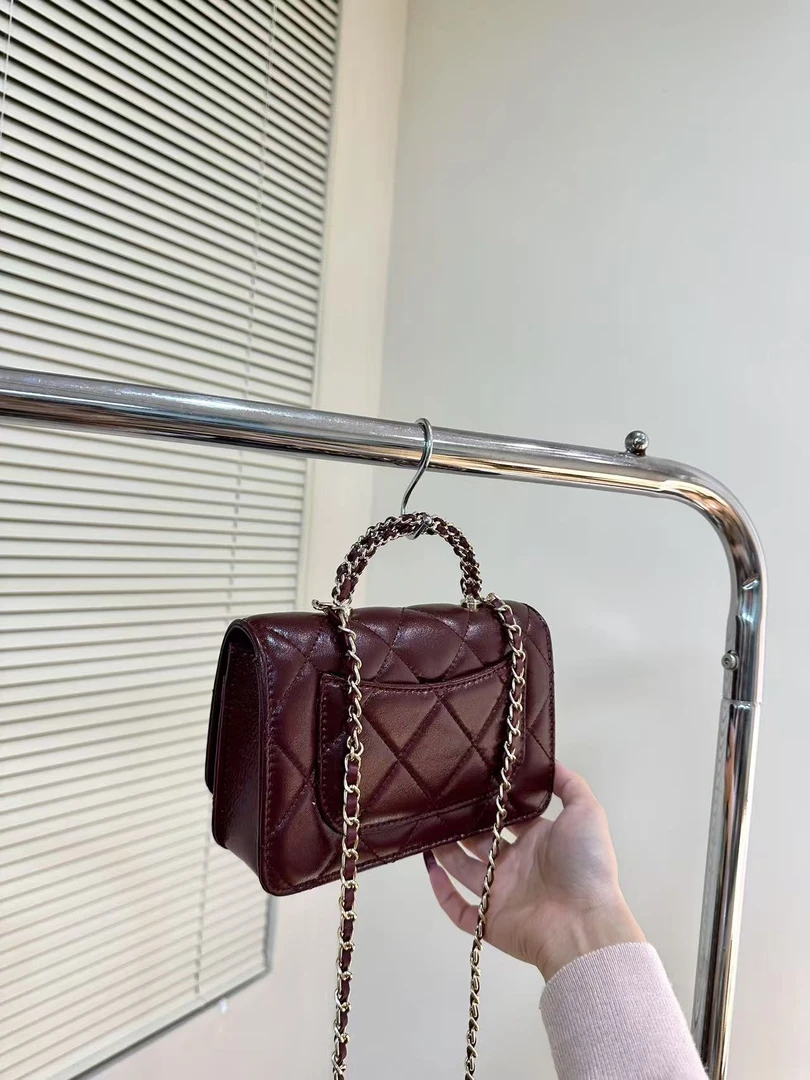 sister【24b交叉woc】时尚高级手柄斜挎包（无公仔挂件）