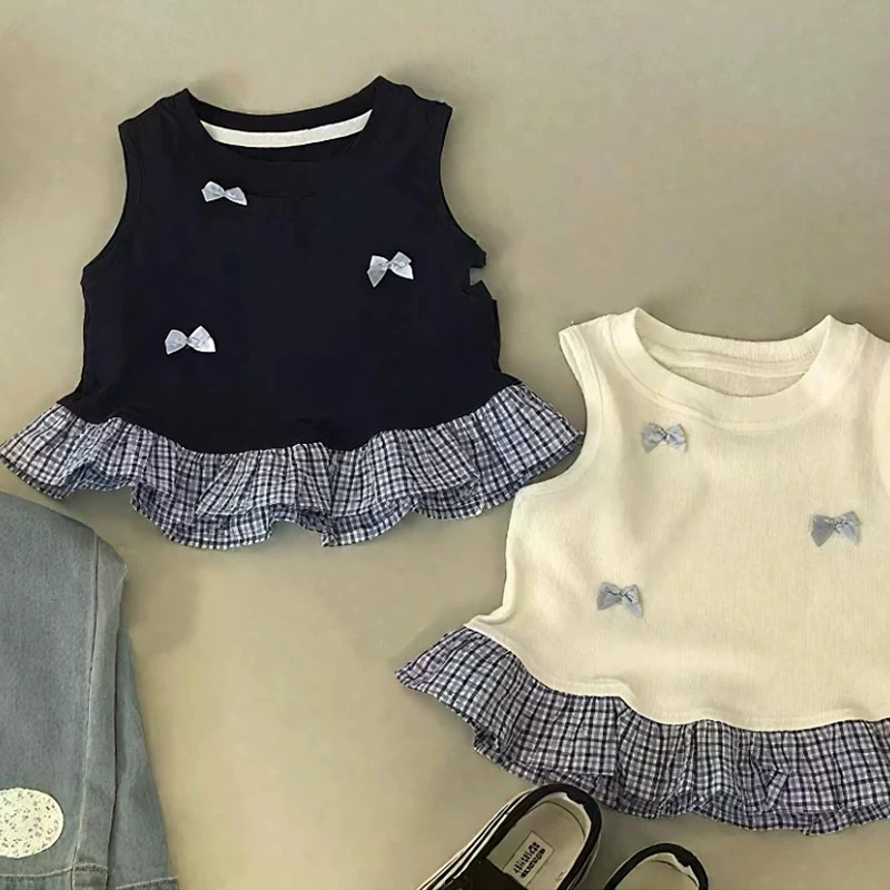 蓝色格子花边背心