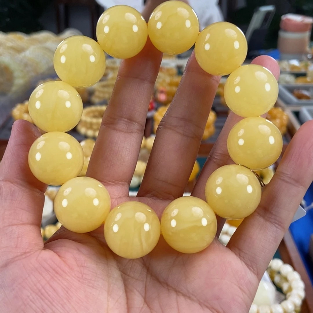 琥珀未镶嵌珠宝奇石20同料鸡油黄圆珠54.48