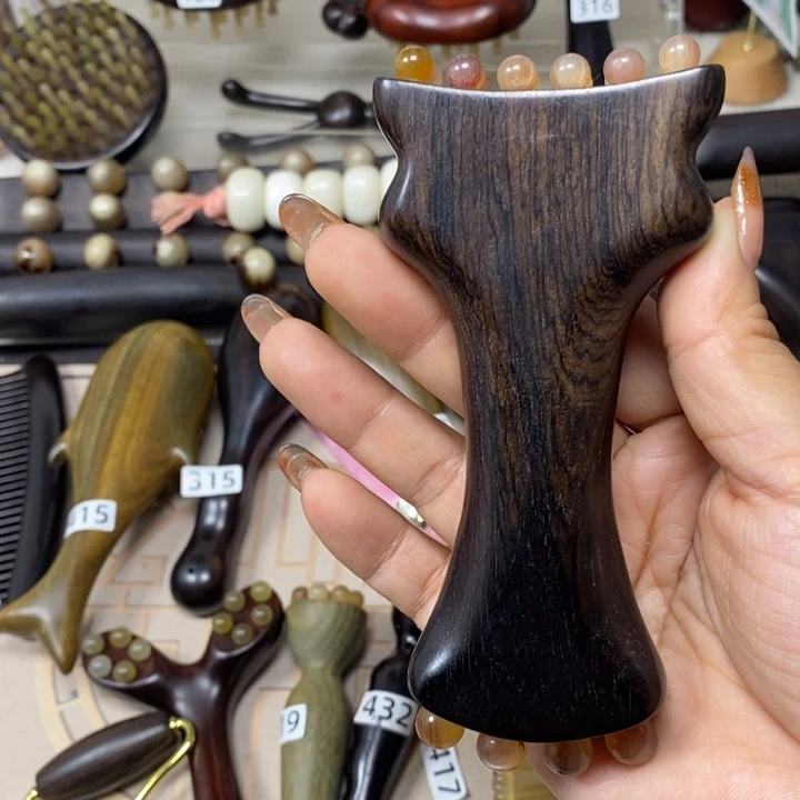 紫光檀羊尊按摩梳