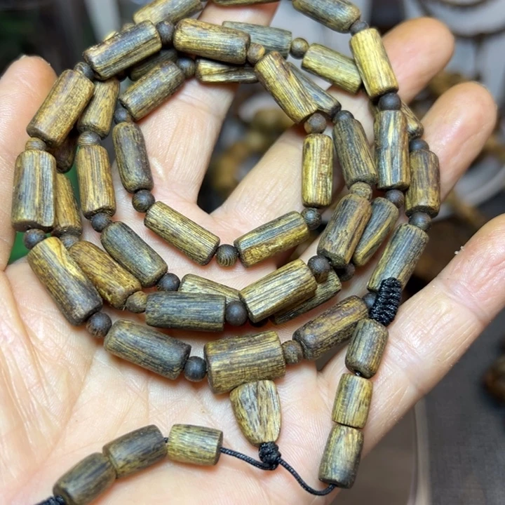 沉香碎屑沉香99沉随形桶珠20克