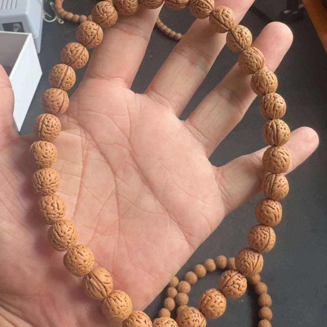 纯****小桃核手持小桃核