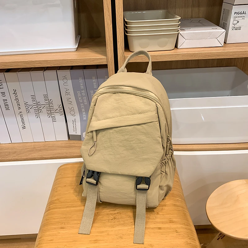 2025新款时尚车缝线拉链纯色胸包运动风双肩包布包ins风双肩背