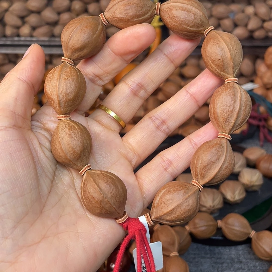 Y***强手串/手链橄榄核梅林铁核2027手串