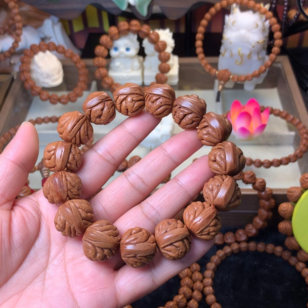 桃核吊坠豹子头手串20