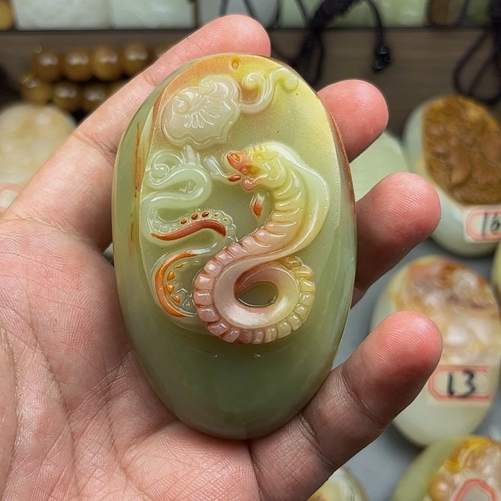 昌***石材方解石手把件