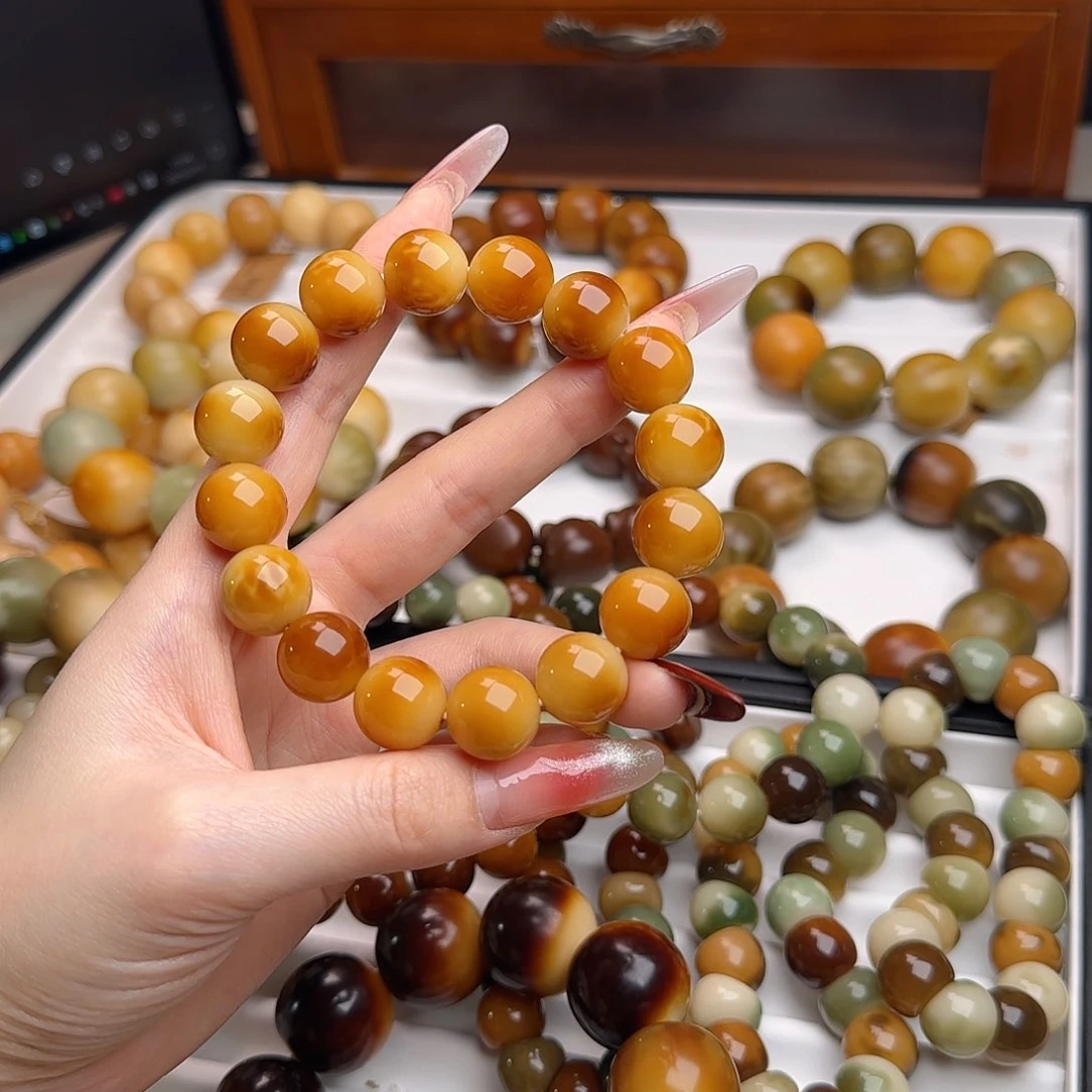 菩提根/象牙果手串?***?卡14水磨圆珠默认微瑕