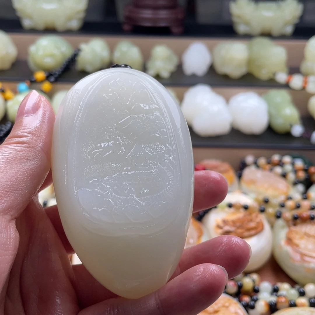 小***)石材天然古青石手把件