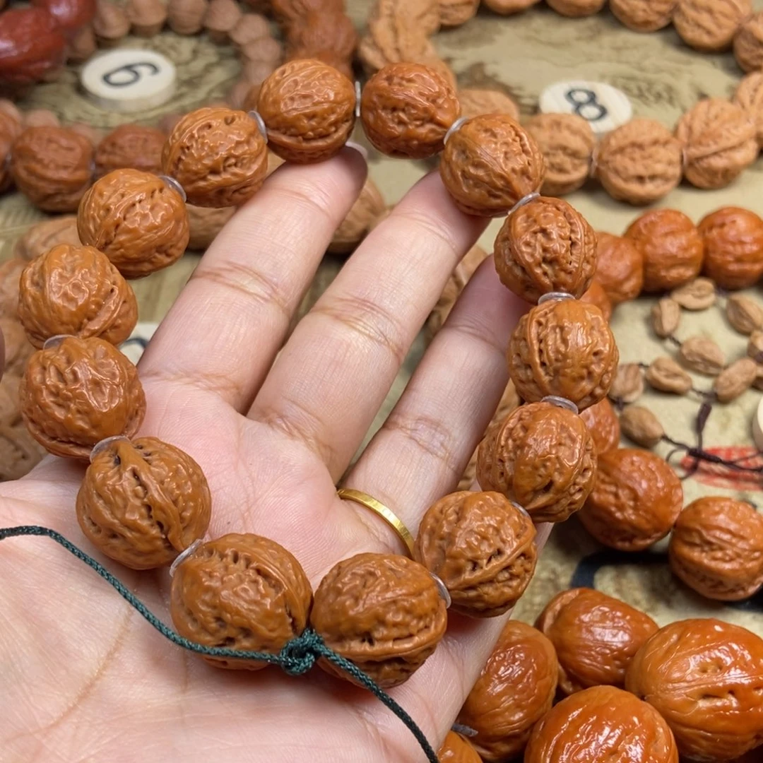 汉***头文玩核桃吊坠肉筋八棱文玩核桃