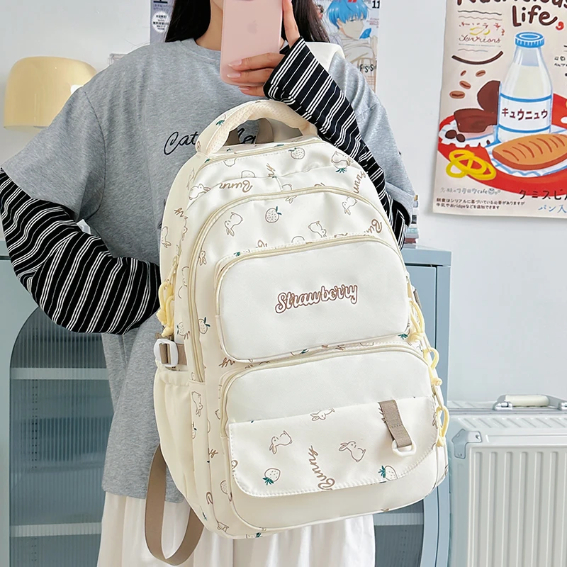 纯色书包初高中大学生男女生百搭韩版时尚轻便潮流简约双肩背包