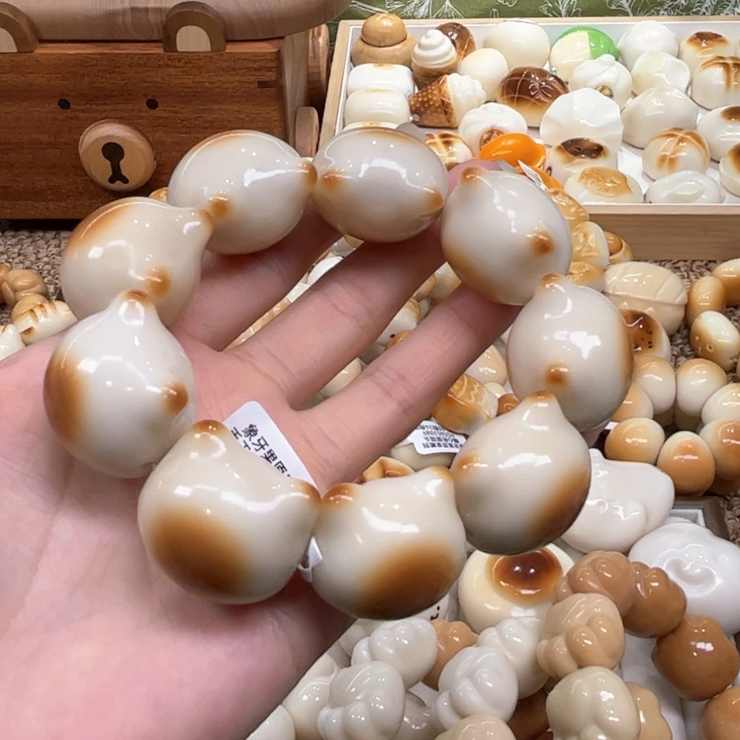 菩提根/象牙果手串9.27.26象牙果碳烤猫头微瑕