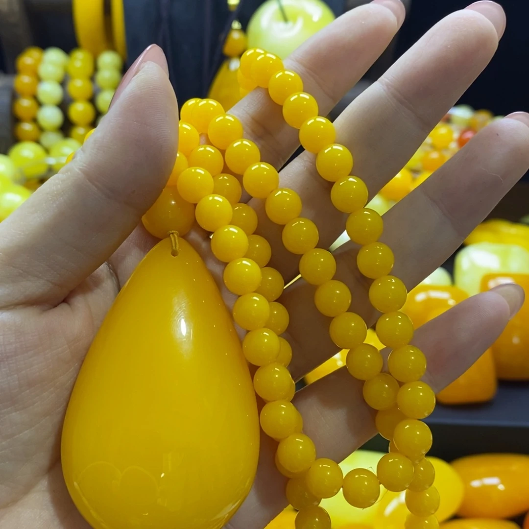 悠***者满油满密鸡油黄108和中号水滴