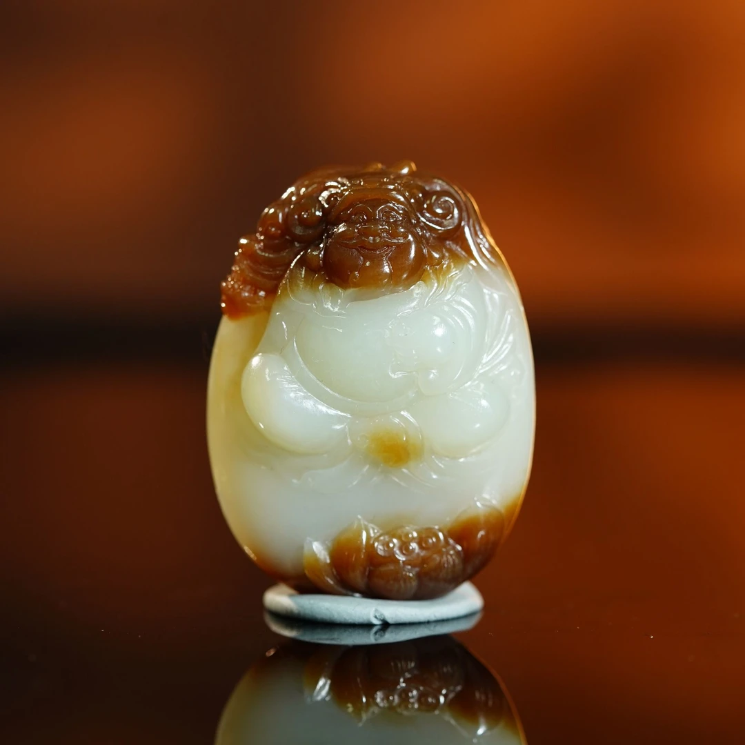 和田天地糖白玉俏雕财运连连手把件 48.19g L251027045