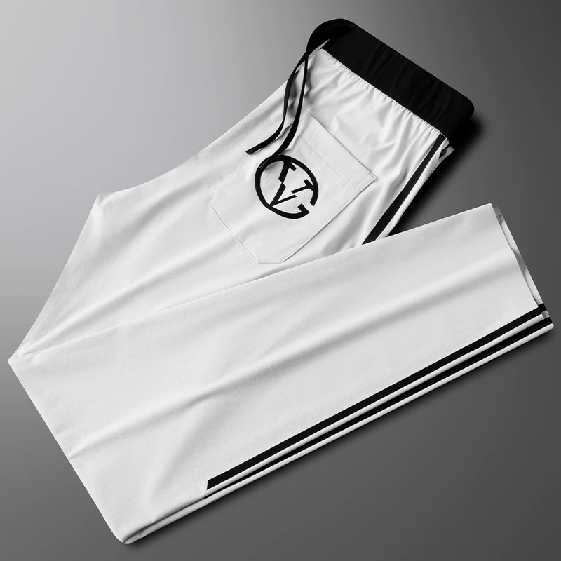 高端夏季冰丝速干休闲裤男直筒撞色薄款凉感弹力时尚印花运动卫裤