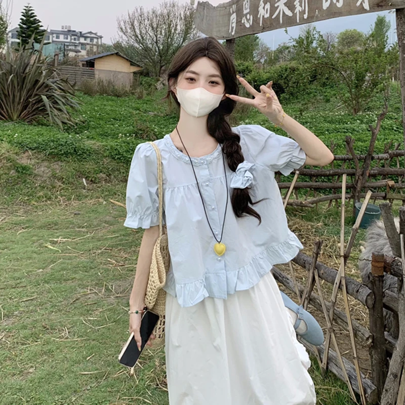 蓝色泡泡袖上衣女气质多巴胺小众套装法式娃娃衫短袖2025新款衬衫