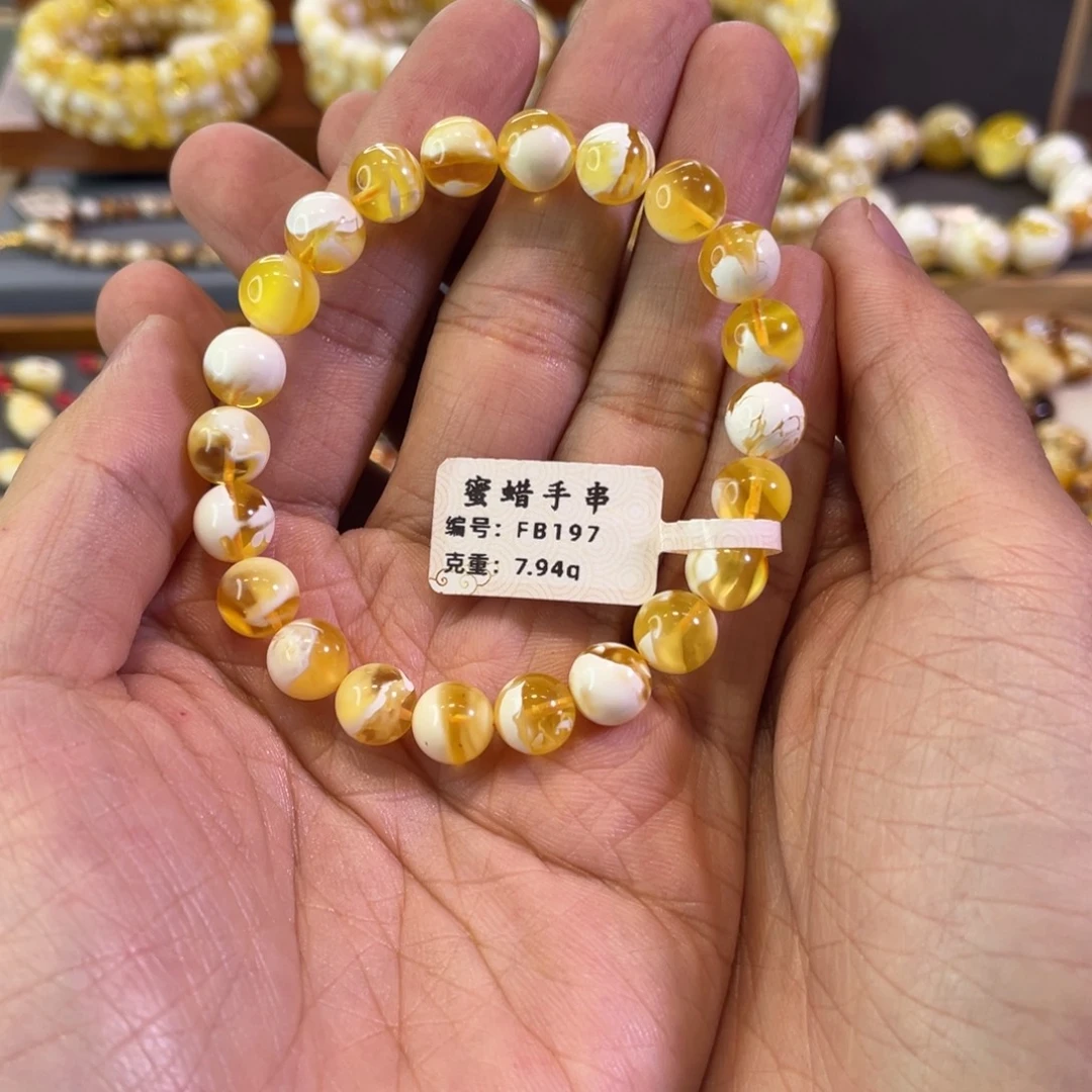 琥珀未镶嵌裸石金漆白圆珠手串
