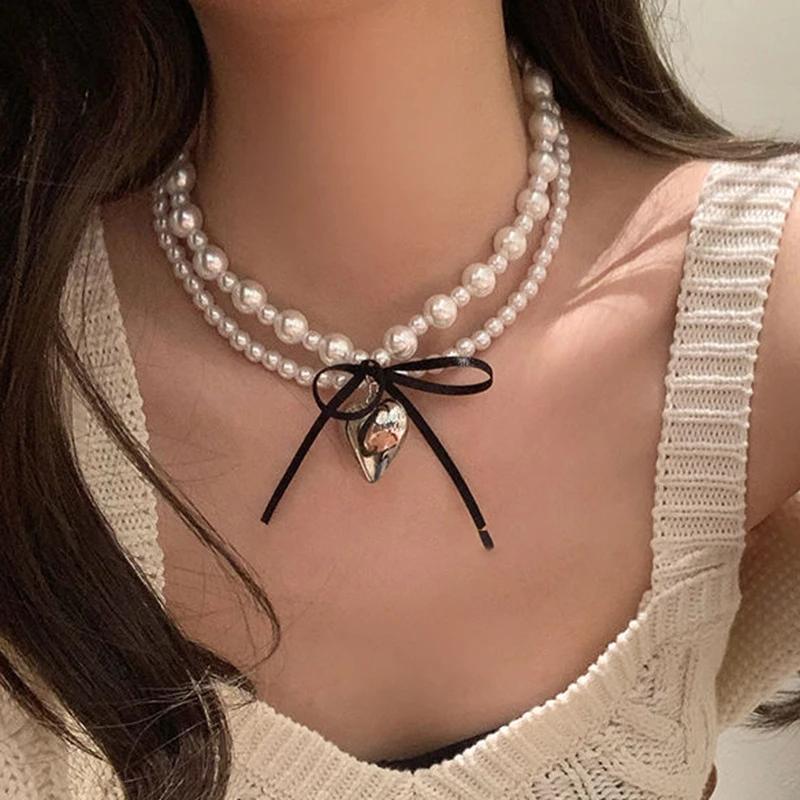 合金亚克力项链 白色爱心项链女轻奢小众锁骨链感新款颈链配饰