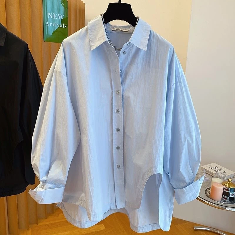 时尚蓝色衬衫女2025年春秋季新款长袖宽松不规则设计感上衣休闲女