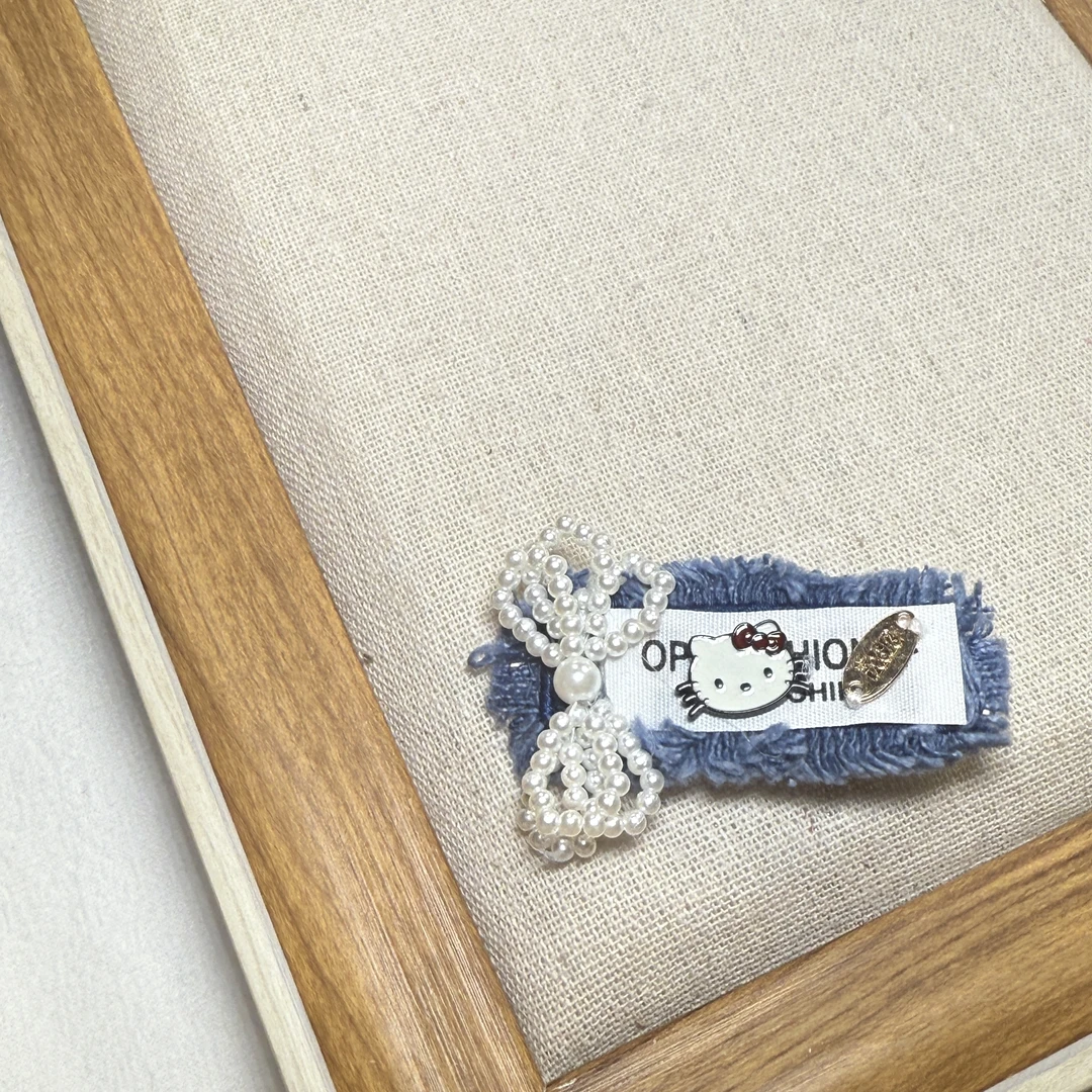 买手店白色KT猫咪蝴蝶结牛仔边夹