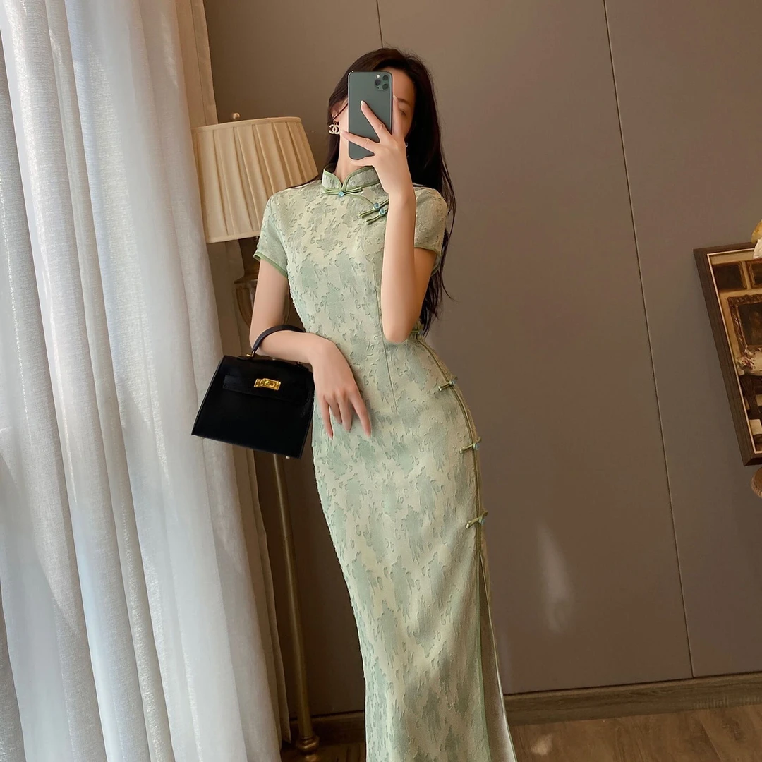 绿色改良旗袍民国风大小姐2025新款年轻少女碎花连衣裙女