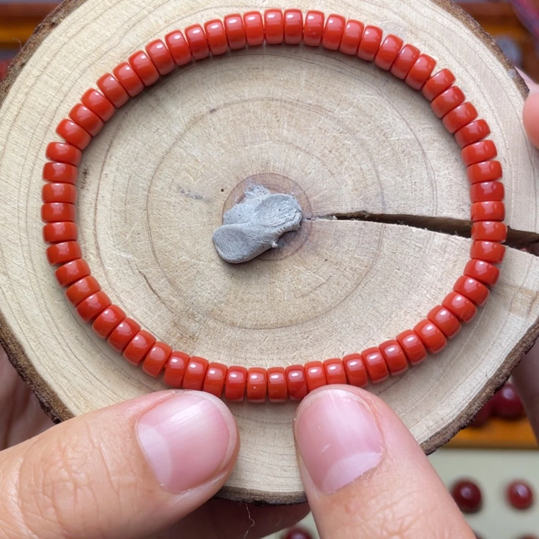 刘***留南红玛瑙未镶嵌5mm柿子锦药片手串