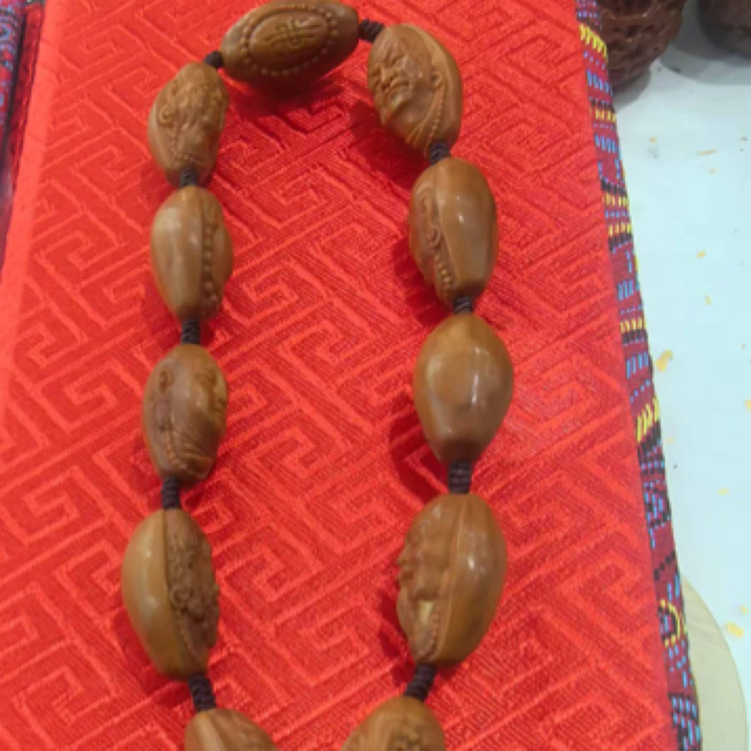 卡12橄榄核雕手持 一单/100