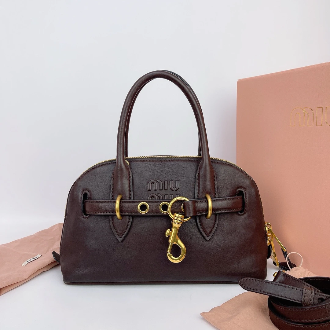 95新 MIU MIU/缪缪 缪缪 棕红色保龄球单肩包底长28 E195