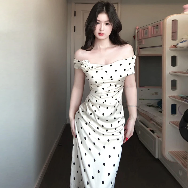 2025夏季新款高级感白色波点吊带连衣裙子女法黑色长款修身连衣裙