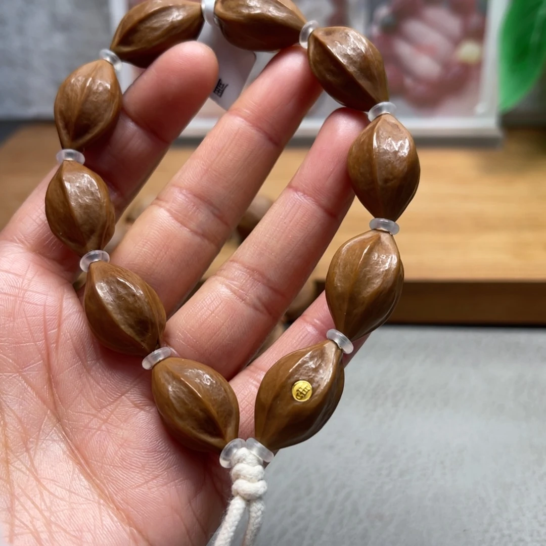 吊坠橄榄核三面佛手串