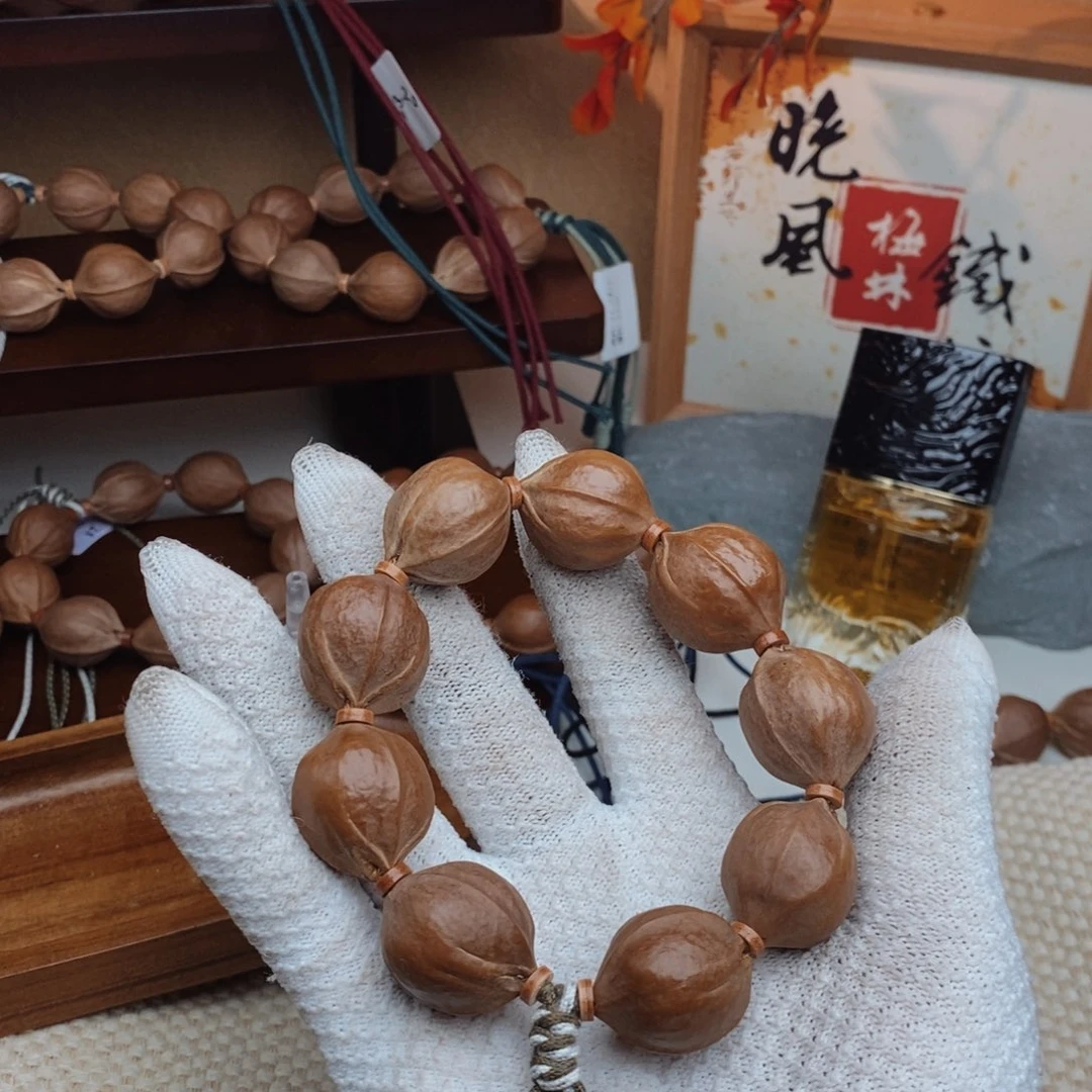 黄***元橄榄核手串/手链22.26