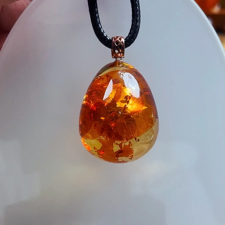 v***y裸石琥珀银S925镶嵌吊坠