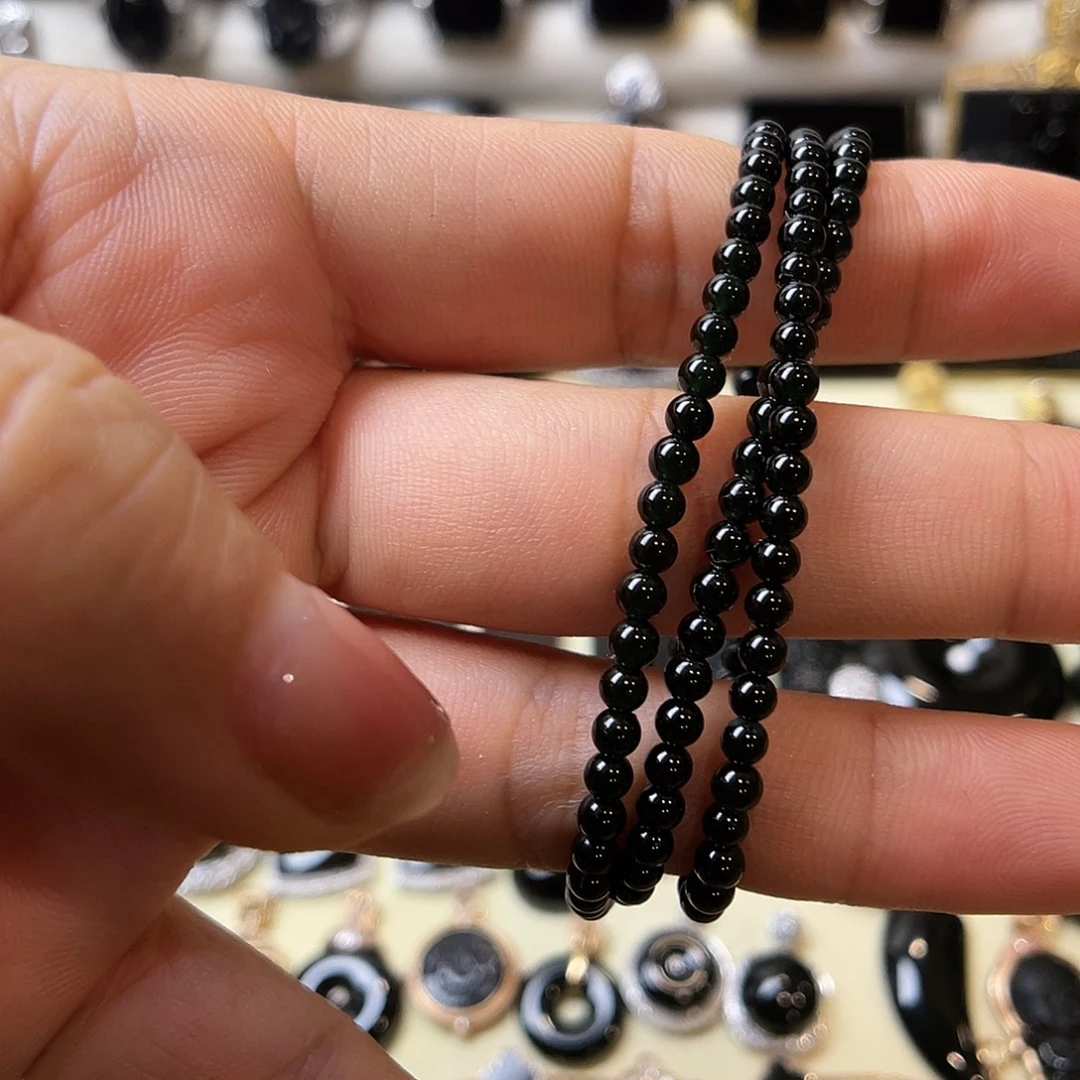 杭***配翡翠未镶嵌颈饰墨翠