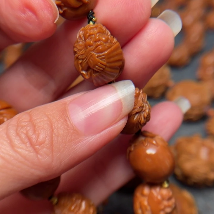 橄榄核吊坠牛****歌橄榄核