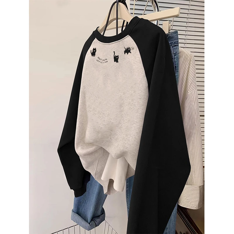 2025秋冬新款印花卫衣女撞色插肩长袖小众设计感宽松大码圆领外套