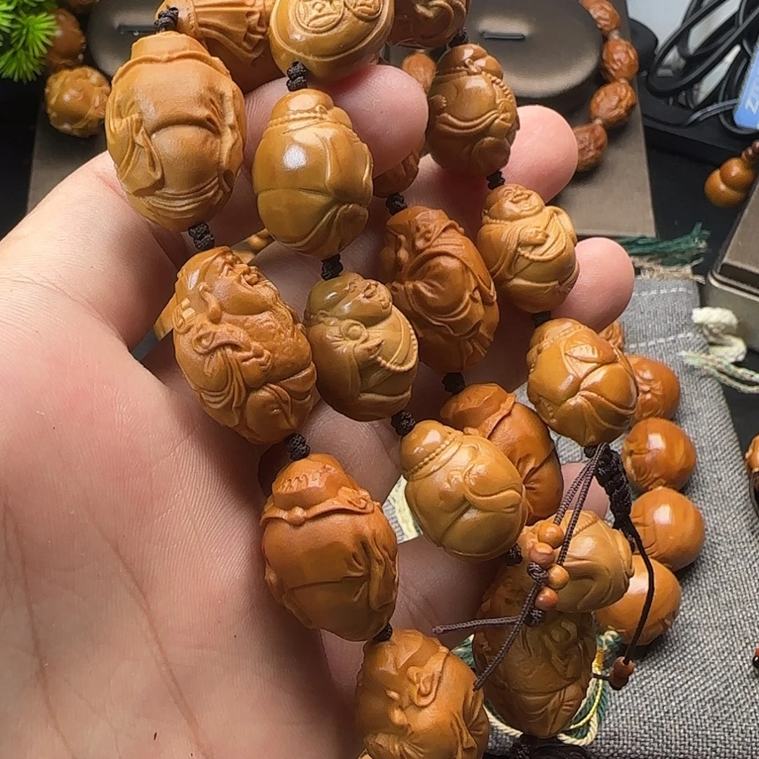 洛***司橄榄核手串/手链一条米勒，一条财神