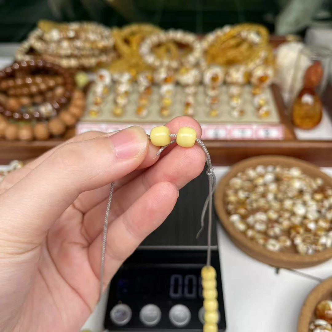 蜜蜡老邢好看尺寸7mm乘6.5mm左右两颗一组