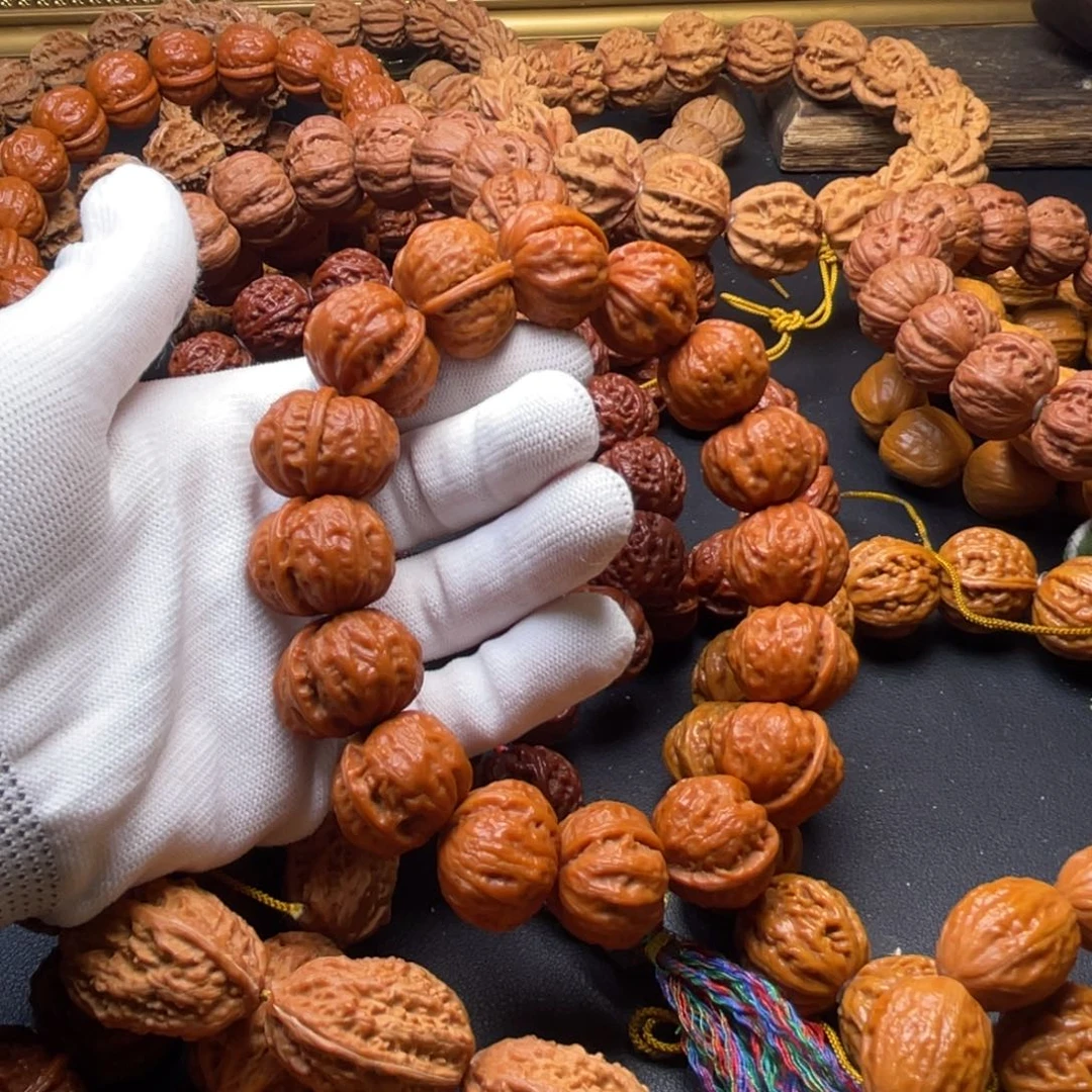 沙***。手串文玩核桃橘红皮磨