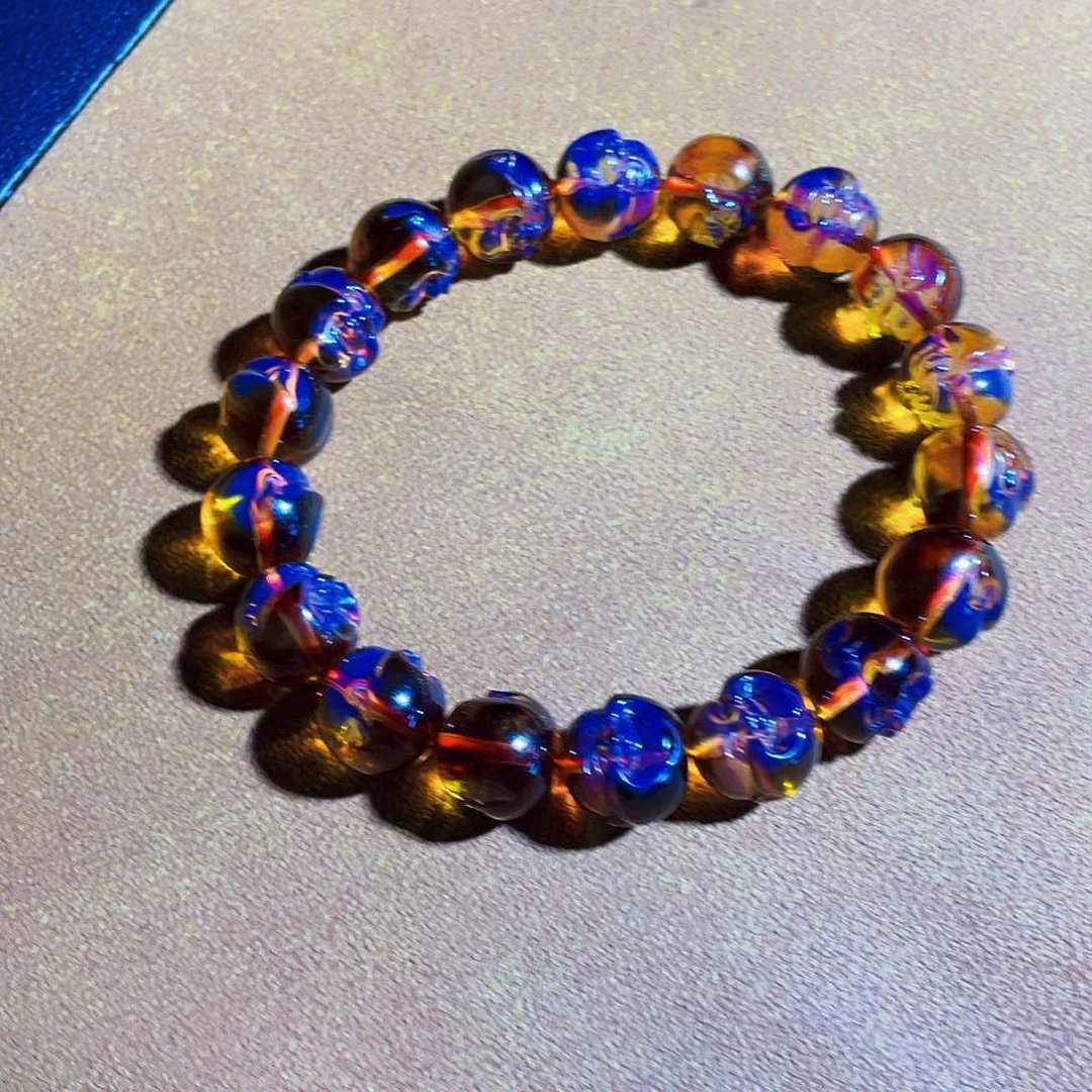 安***笑未镶嵌蓝珀裸石红蓝佛头11